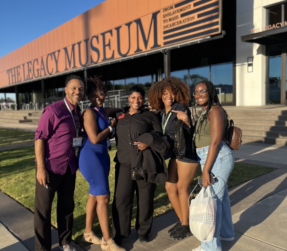 Marcus Watson, his wife, and Africana Studies majors at the Legacy Museum in Montgomery, AL
